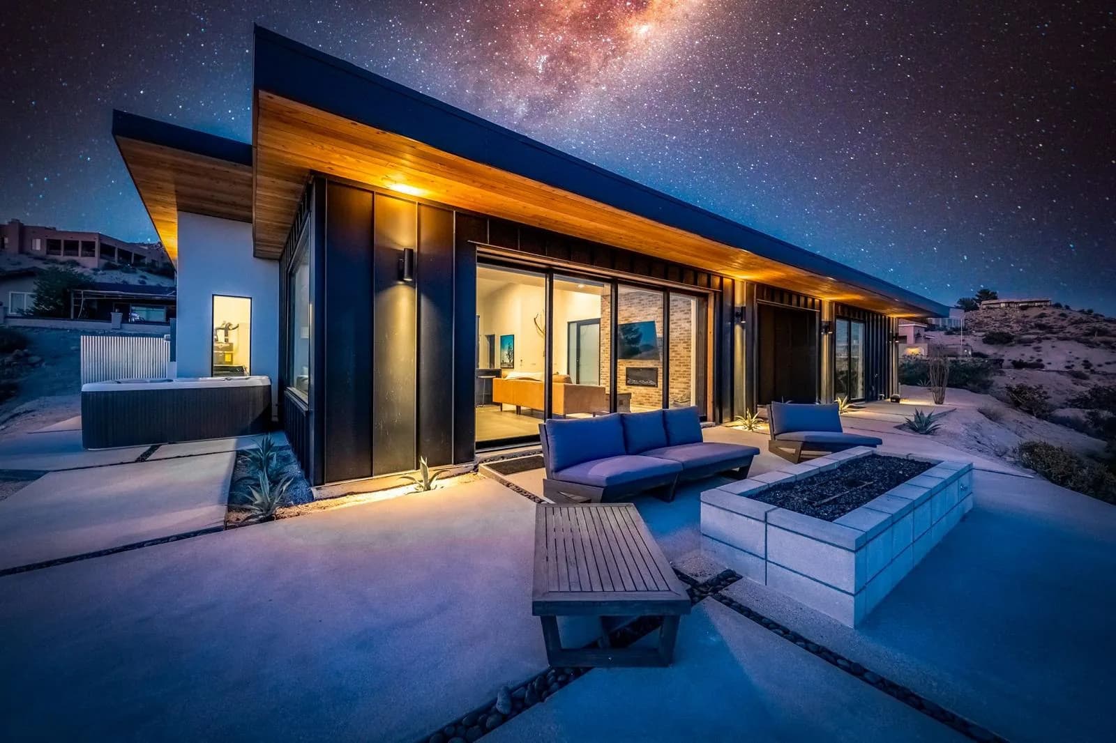 Modern desert home at night